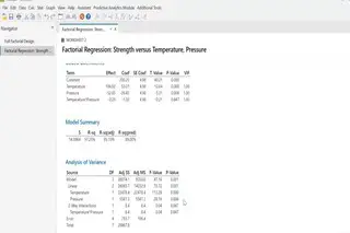 Minitab dashboard with tables of data for factorial regression.